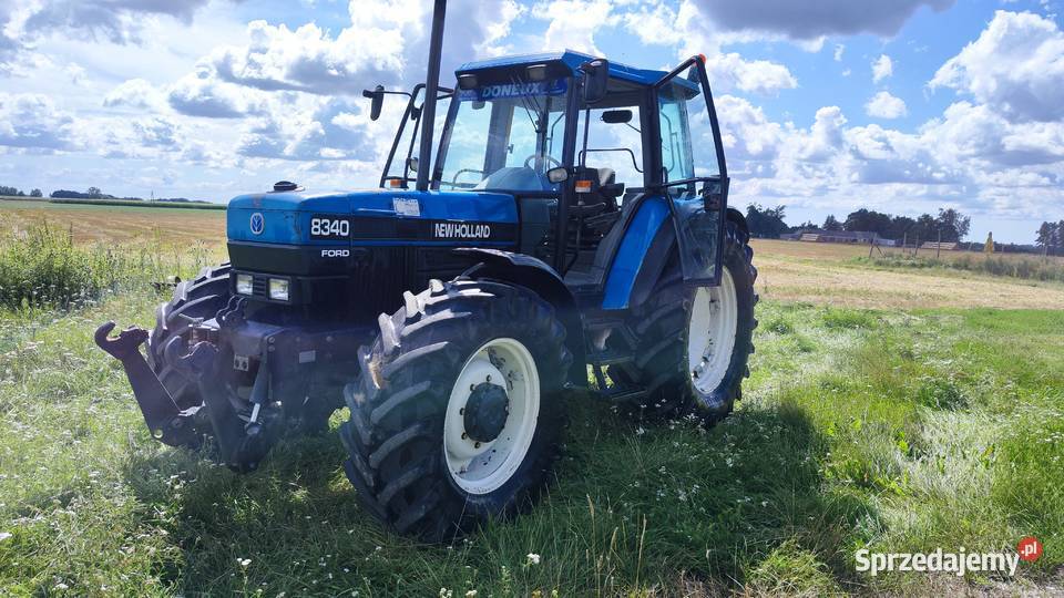 Sprzedam ciągnik Holland Ford 8340 z Tuzem Napęd 4x4 mazowieckie Gozdowo