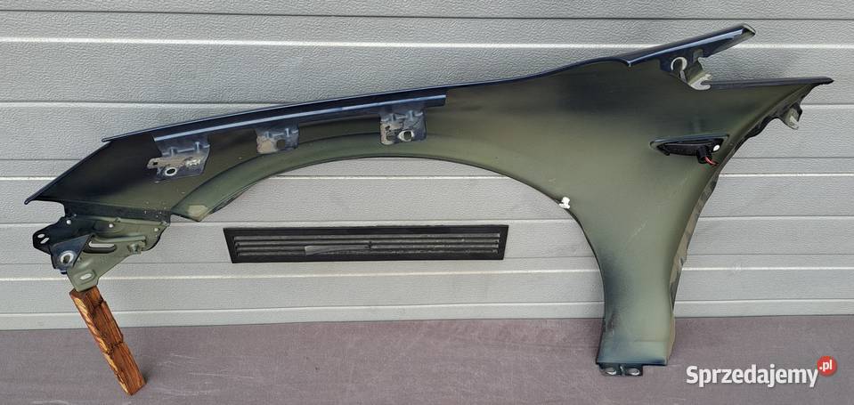 Błotnik prawy przód Opel Astra J 0915 Z22A osobowe Błotniki Mielęcin
