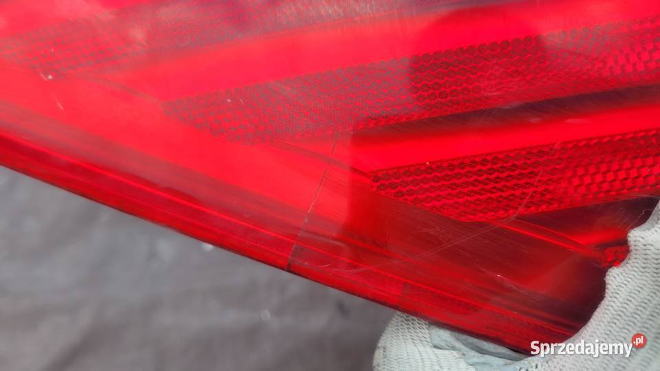 NISSAN TIIDA 5D LAMPA TYŁ LEWA 26555EM01A HELLA śląskie Ruda Śląska