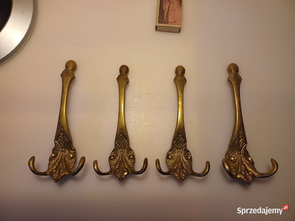 Komplet czterech dużych wieszaków Mosiądz Poznań