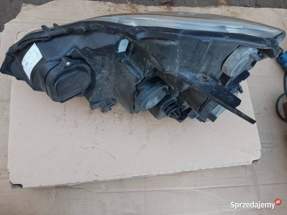 Lampa modus soczewka prawa strona renault Oświetlenie Bychawa sprzedam