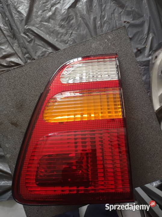 Lampy lampa tył Toyota land Cruiser hdj100 Rok produkcji 1998 Łódź