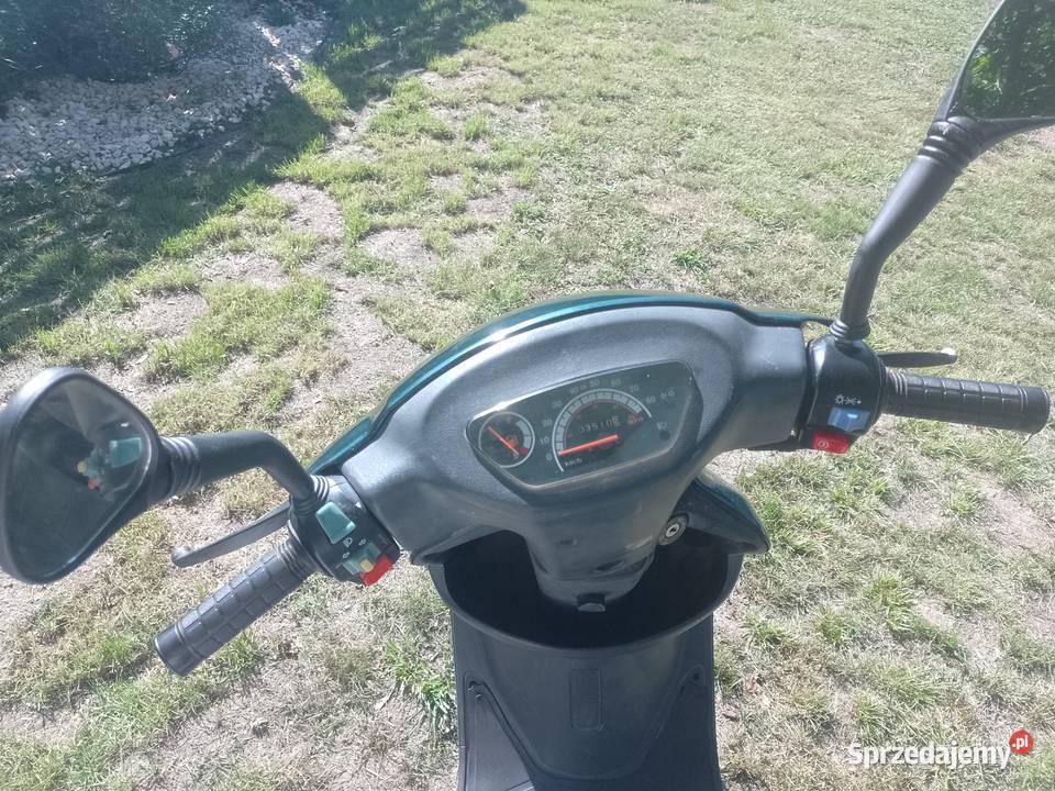 Skuter Kinroad z kaskiem Osse