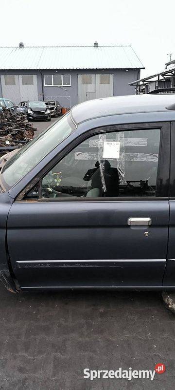 DRZWI LEWE PRZÓD MITSHUBISHI MONTERO Pozostałe