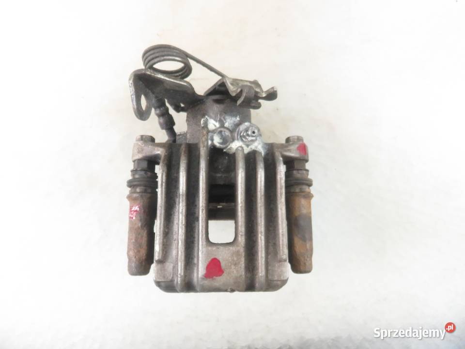 ZACISK PRAWY TYŁ AUDI A6 C5 KOMBI