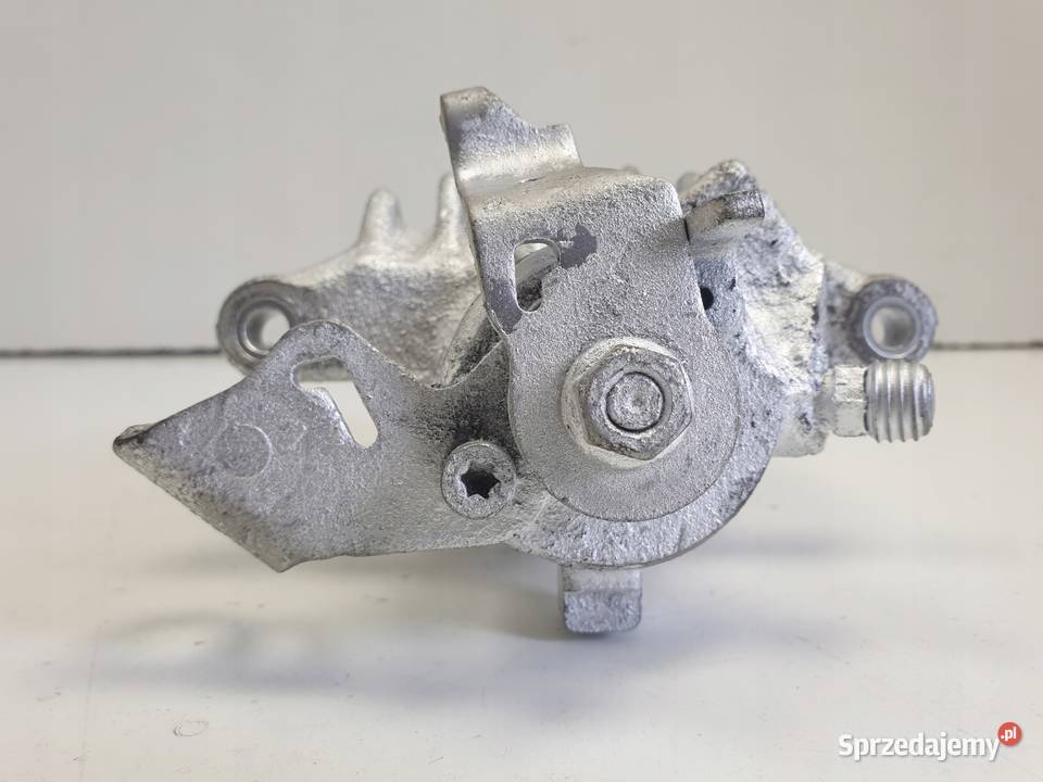 VW Golf IV LEWY ZACISK HAMULCOWY tył KIEROWCY Janów