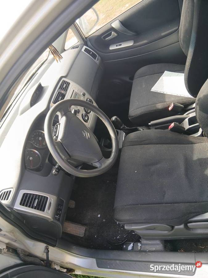 Suzuki liana czesci lampy drzwi maska łódzkie