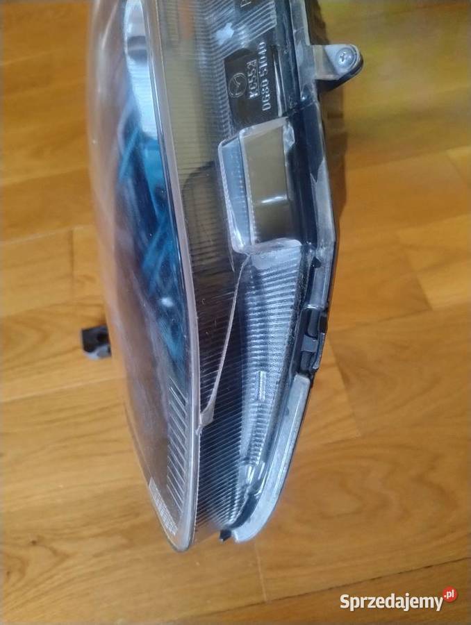 Mazda 2 0714 lampa reflektor lewa przednia przód Ślesin