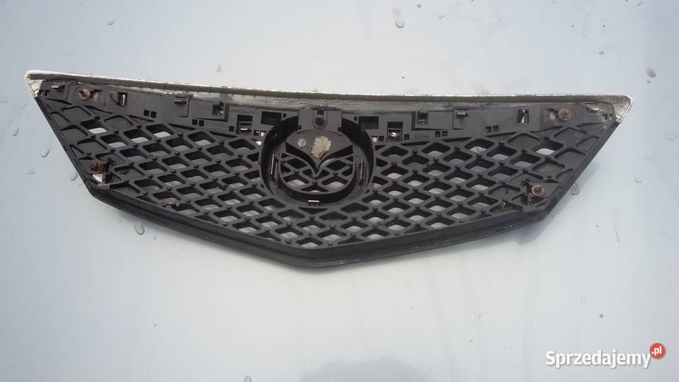 LAMPA PRZEDNIA GRIL MAZDA 2