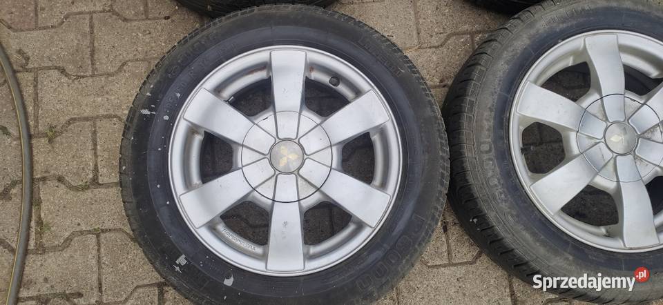 Felgi alu 4x100 14 opony letnie 18560 Mitsubishi Godków