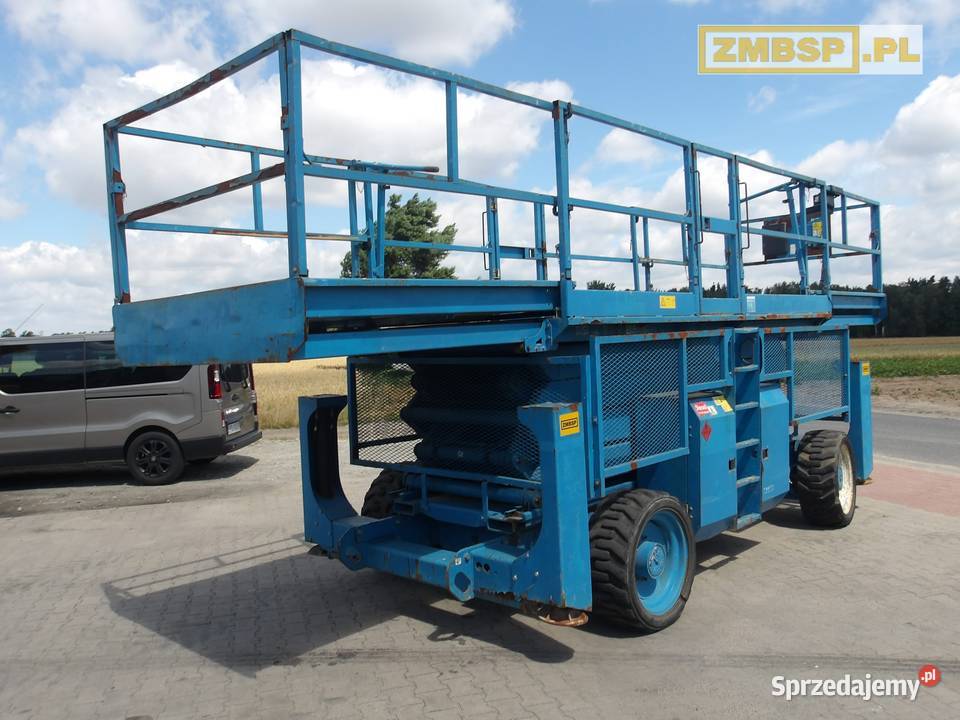 Podnośnik nożycowy spalinowy 4x4 Genie GS4390RT Dźwigi, podnośniki