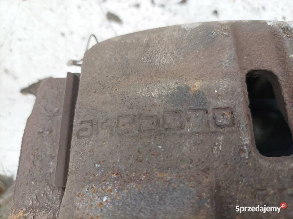 ZACISK HAMULCOWY LEWY PRAWY PRZÓD 12 TCE KPL