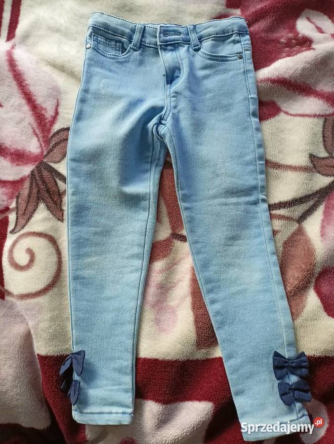 Spodnie jeansowe 110 z kokardką nowe bez metki 4 lata+