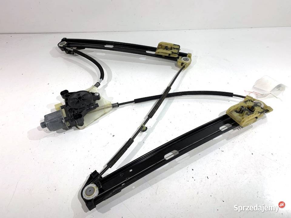 PODNOŚNIK SZYBY LEWY PRZÓD VW TROC 2GA837461F Motoryzacja