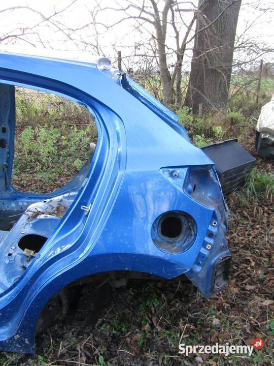 ĆWIARTKA BŁOTNIK LEWY TYŁ 44J MAZDA 2 DJ osobowe