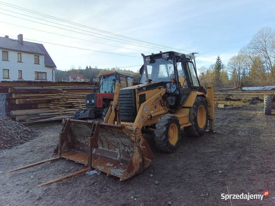 Cat 428 b koparko ładowarka Sól