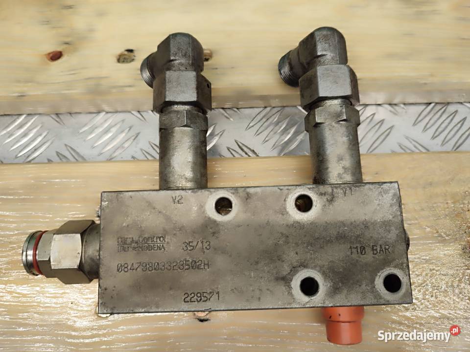 Zamek hydrauliczny siłownika łyżki 229571 Wilkowo