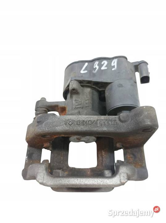 ZACISK HAMULCOWY LEWY TYŁ 12 B 9819059380 Opel