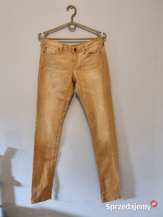 Jeansy damskie musztardowe Guess 28 Moda i Styl sprzedam