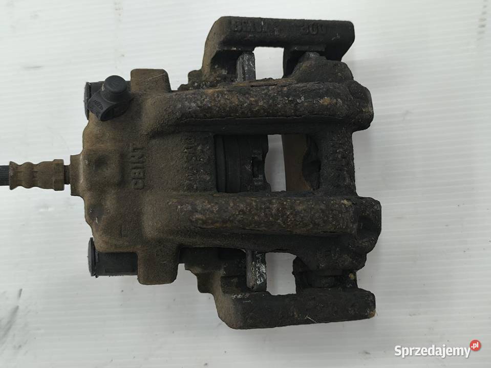 ZACISK LEWY TYŁ BMW F30 F31 20D LIFT