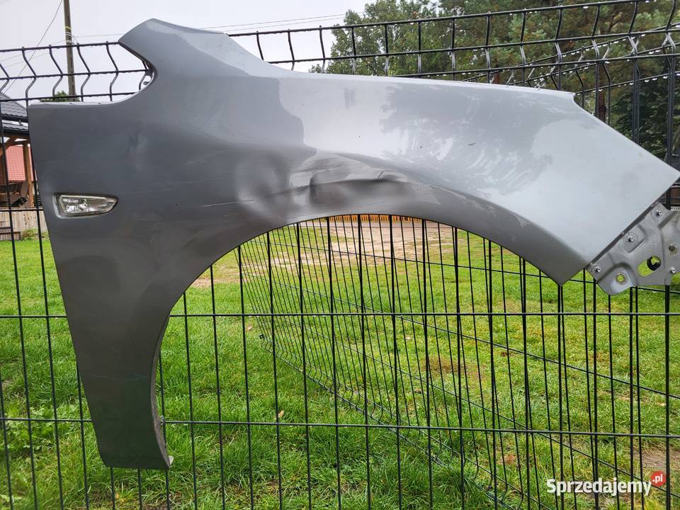Błotnik opel astra J Stany
