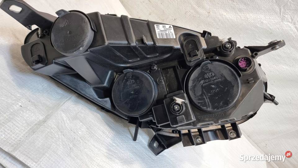 Opel Combo D lampa lewa przód 520868580E