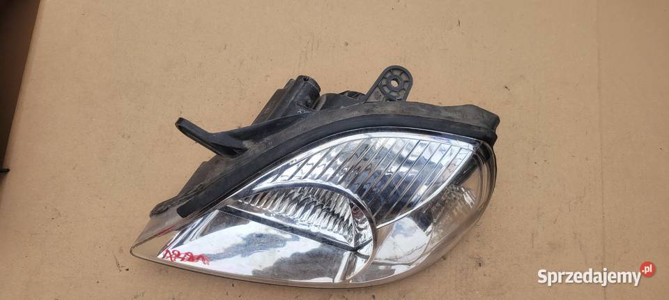 KIA RIO I LIFT LEWY REFLEKTOR LAMPA LEWA PRZOD Ruda Śląska