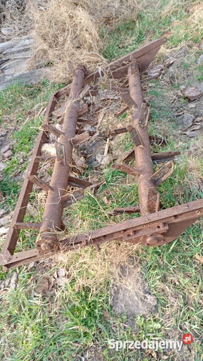 Adapter rozrzutnika jednoosiowego