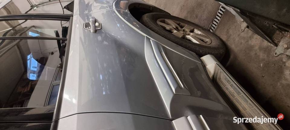 DRZWI LEWE TYŁ MITSHUBISHI PAJERO IV V90 A19