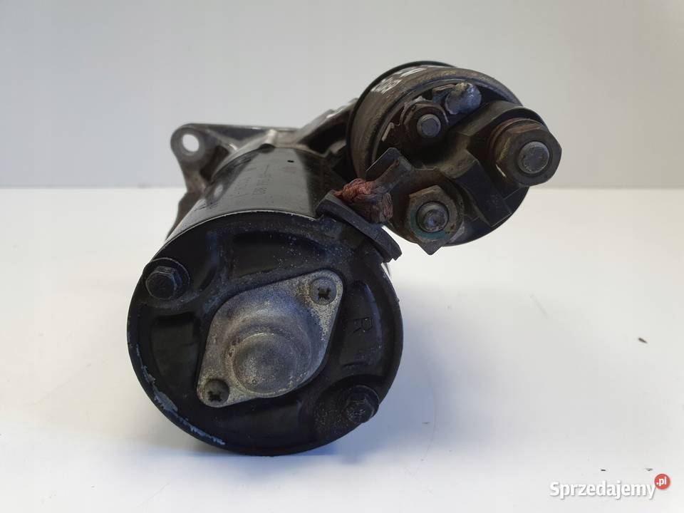 Opel Corsa D 12 16V ROZRUSZNIK 0001107493 bosch Układ elektryczny silnika Janów