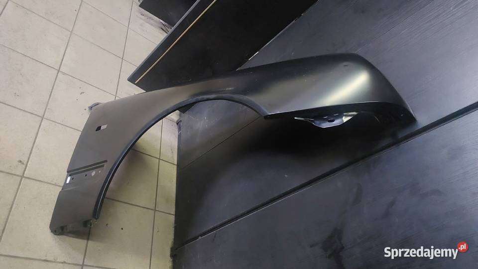 Błotnik przedni prawy nowy Mercedes w210