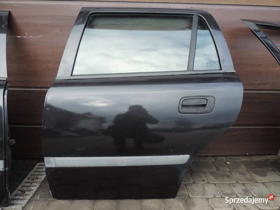 OPEL ASTRA 2 KOMBI DRZWI LEWY TYŁ 298