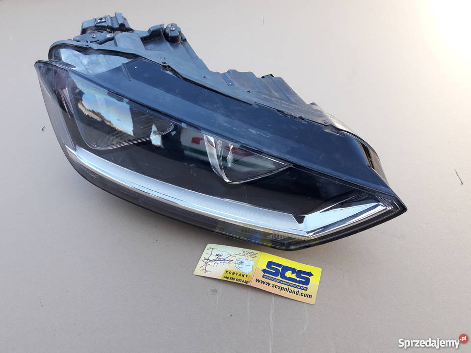 VW SPORTSVAN REFLEKTOR LAMPA PRZEDNIA PRAWA Bieleń