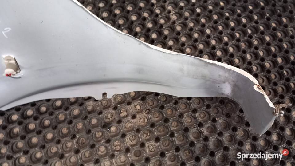 OPEL CORSA D BŁOTNIK PRZÓD LEWY Z40R Zbierkowo