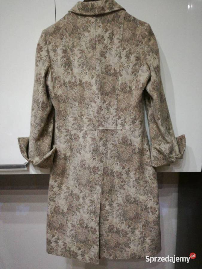 Płaszcz damski w kolorze beżowo brązowym Autog Lublin