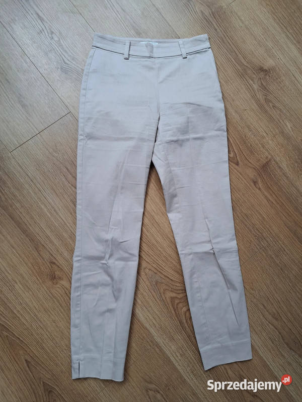 Klasyczne rurki HM w odcieniu pudrowego różu Rozmiar 34(XS) Trąbki Wielkie