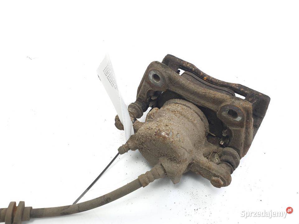 ZACISK HAMULCOWY PRZÓD PRAWY DACIA DOKKER