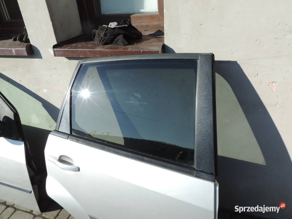 DRZWI PRAWY TYŁ FORD FIESTA MK5 5D KOLOR 62 Nowy Sącz