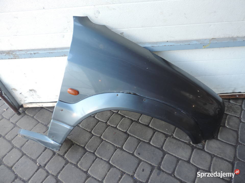 SUZUKI GRAND VITARA I BŁOTNIK PRAWY PRZÓD ZY4C13 Nowy Sącz