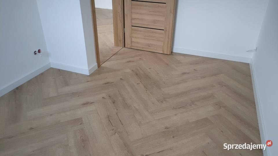 Montaż paneli podłogowych montaż drzwi jodełka Cieszyn