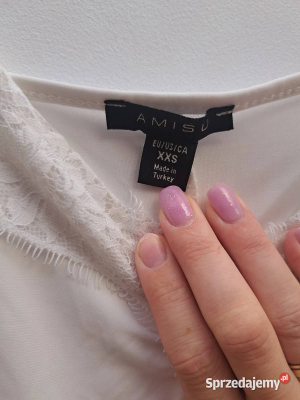 Biała bluzka na ramiączkach z koronką Amisu bez rękawa Trąbki Wielkie