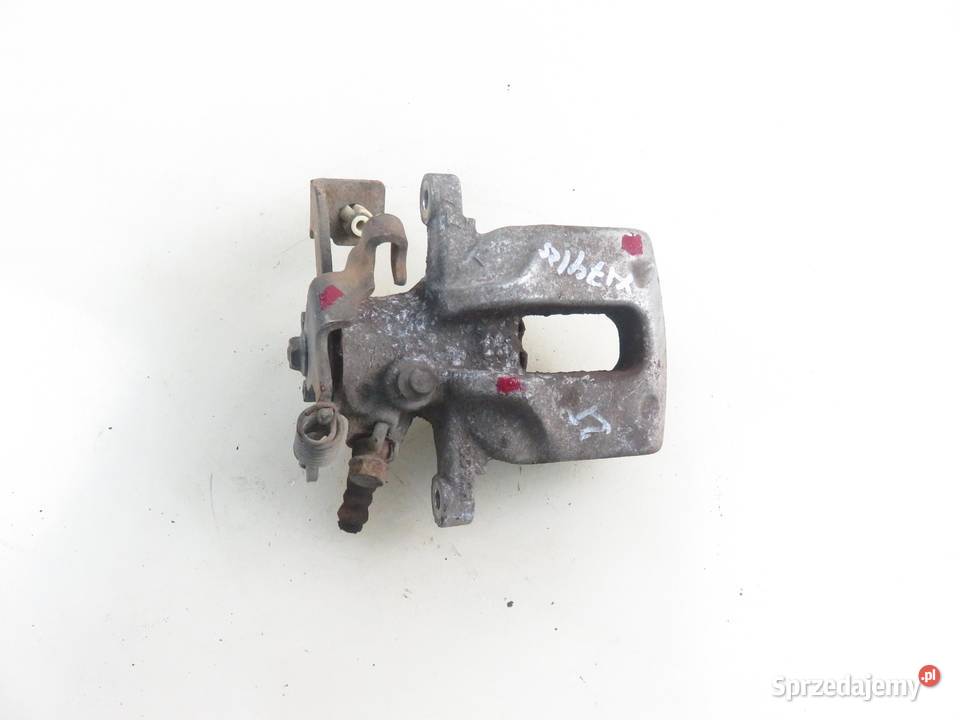 ZACISK LEWY TYŁ TOYOTA AURIS I E15