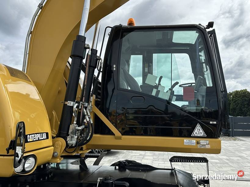 KOPARKA PRZELADUNKOWA CAT M313D 3163 mth Tuliszków