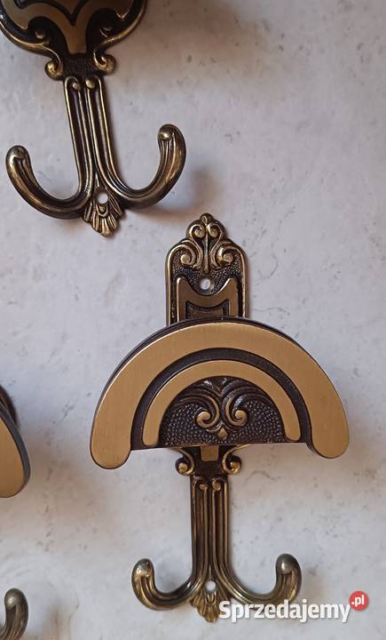 Mosiężne wieszaki Reda