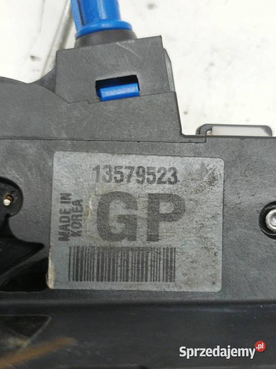 ZAMEK DRZWI PRAWY PRZÓD 13579523 Opel Astra IV