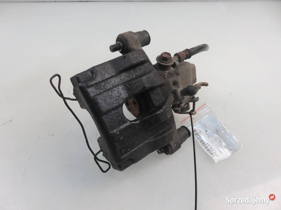 ZACISK PRAWY TYŁ NISSAN PRIMERA P12