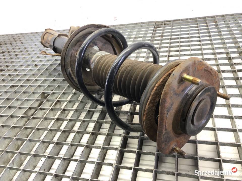 AMORTYZATOR LEWY PRZÓD ZE SPRĘŻYNĄ TOYOTA