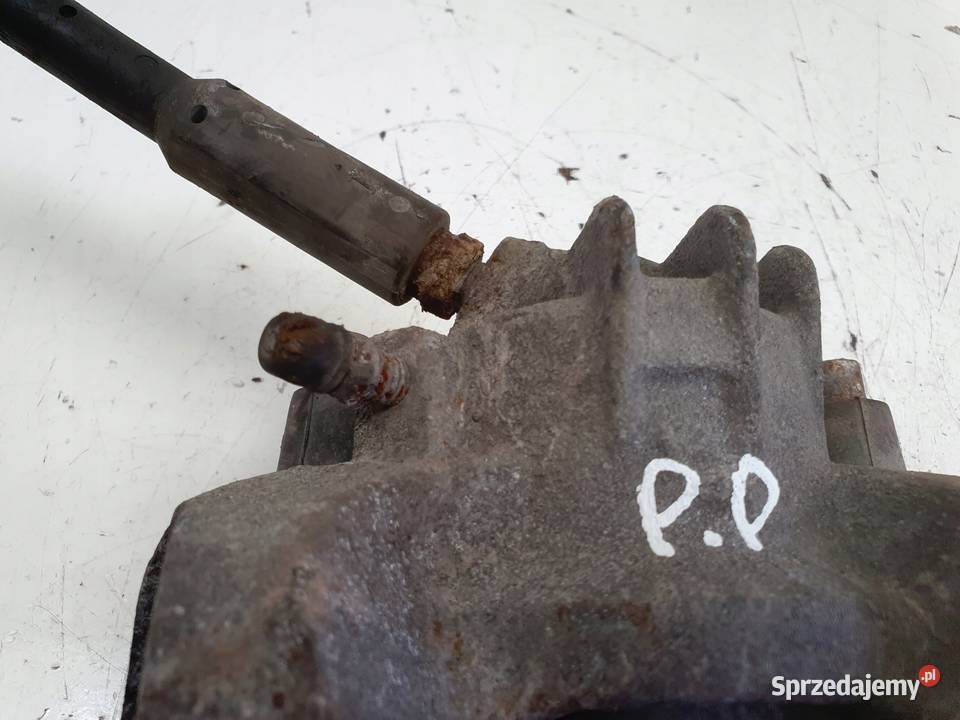 Peugeot Partner I PRZEDNI ZACISK HAMULCOWY prawy