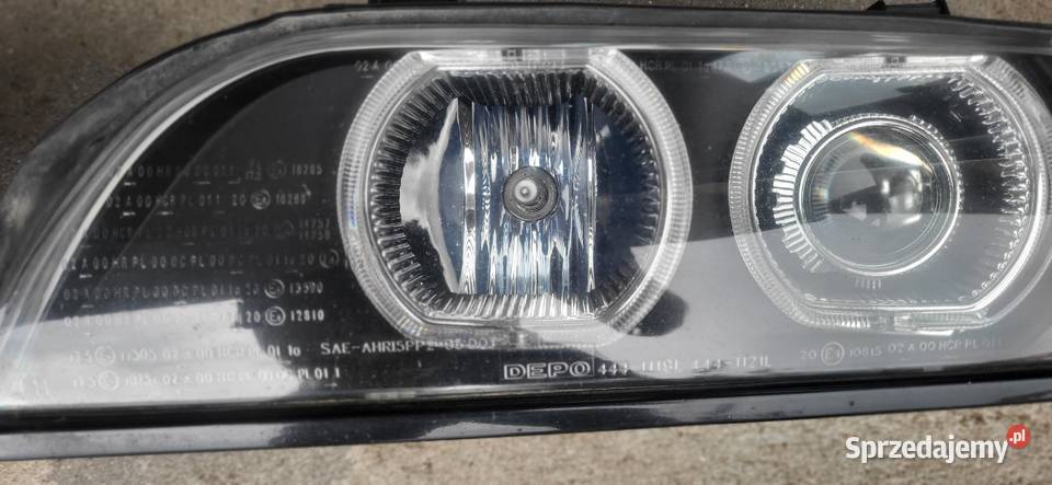 Sprzedam lampy bmw e39 xenon Narol
