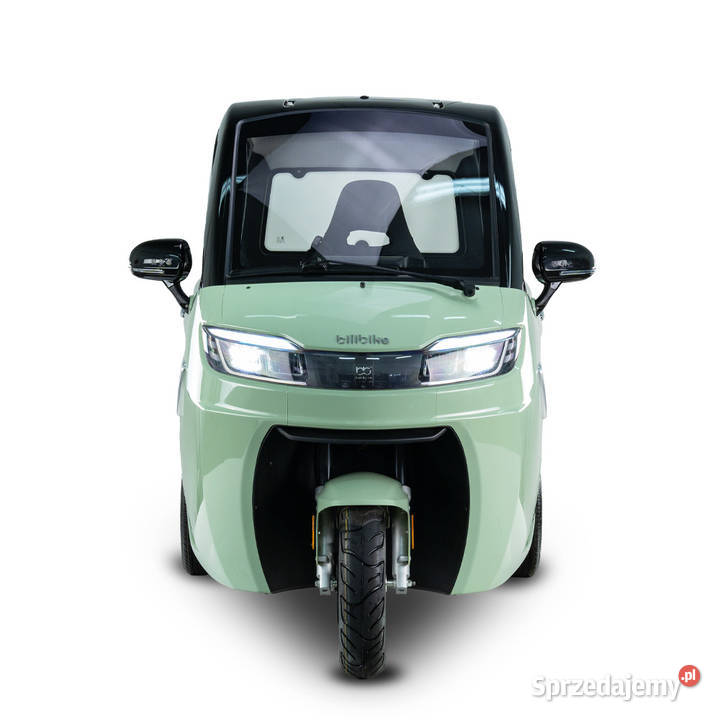 Skuter elektryczny z dachem samochód bez